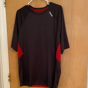 Reebok Men’s Athletic workout short sleeve shirt. Size Medium